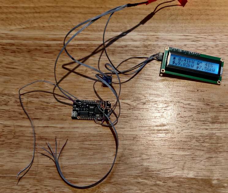 The display connected to the microcontroller with lots of wires